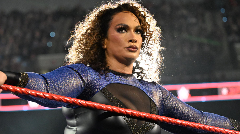 Nia Jax leaning against the ring ropes