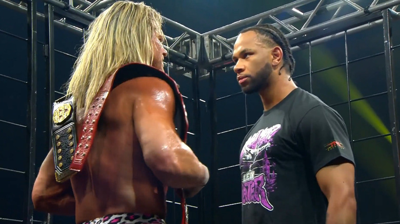 Leon Slater confronts Nic Nemeth inside Lockdown