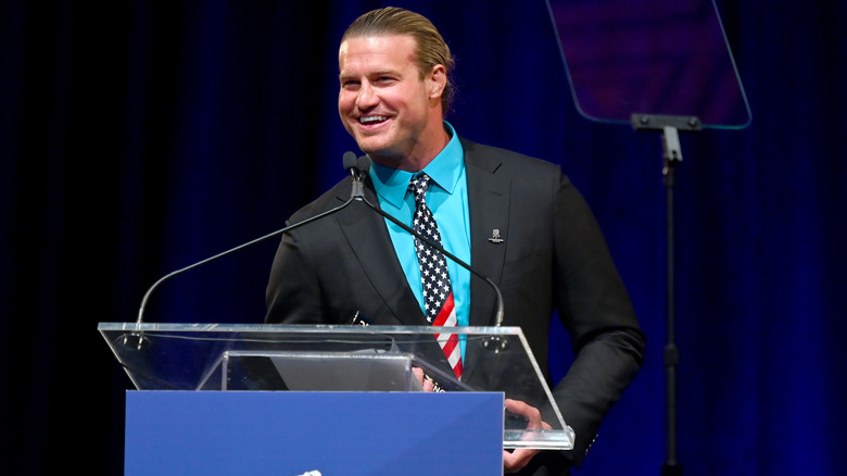 Nic Nemeth speaking at a podium