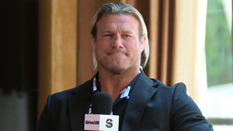 Nic Nemeth holding a SiriusXM microphone