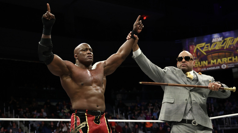 MVP holding up Lashley's hand