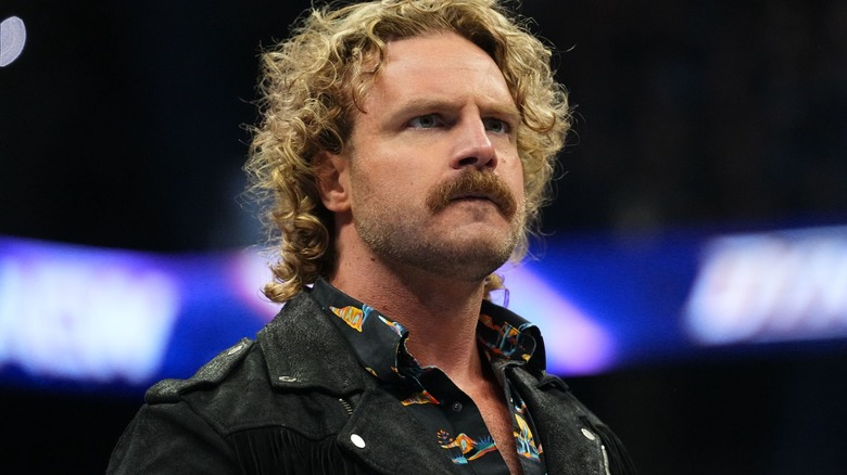Adam Page wearing a black jacket