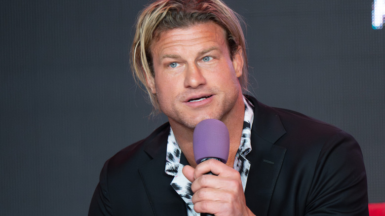 Nic Nemeth holding a microphone