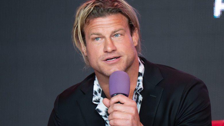 Nic Nemeth holding a microphone