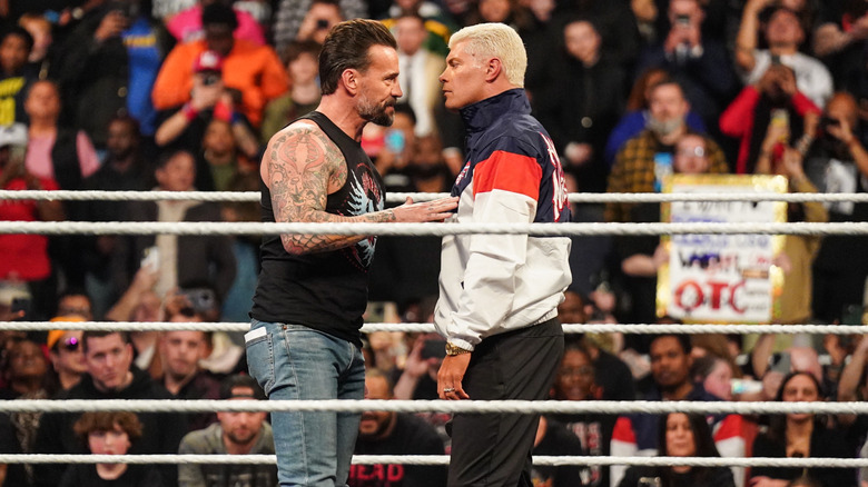 CM Punk and Cody Rhodes speak during WWE Monday Night RAW at State Farm Arena on January 27, 2025 in Atlanta, Georgia.