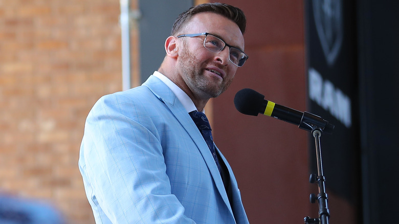 Nick Aldis speaking at a Busted Open event