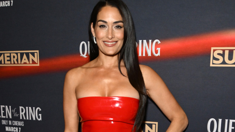 Nikki Bella wearing a red dress