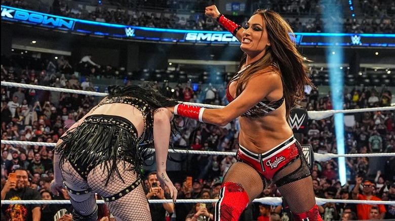 Paige ducks out of a strike from Nikki Bella during their match on the September 11 edition of 