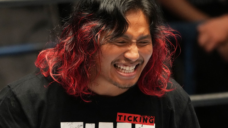 Hiromu Takahashi smiling inside a ring NJPW