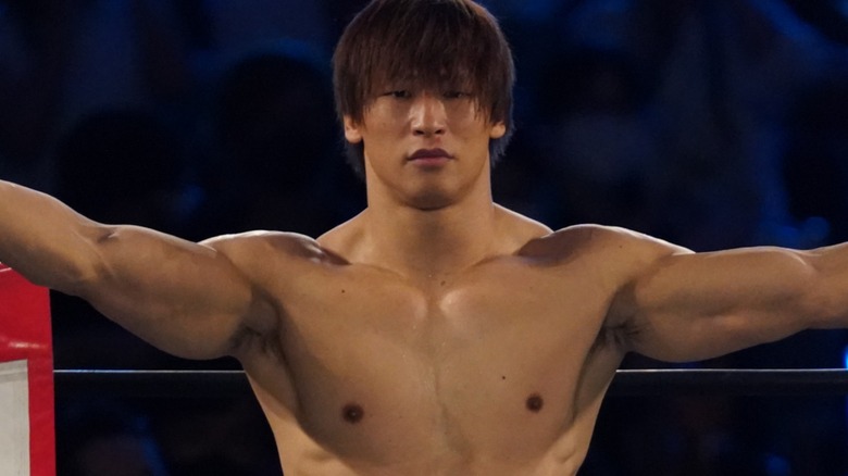 Kota Ibushi with his arms stretched wide