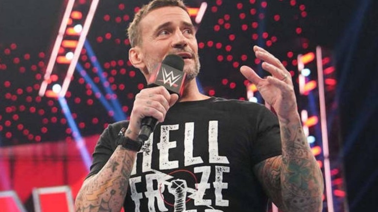 CM Punk with a microphone