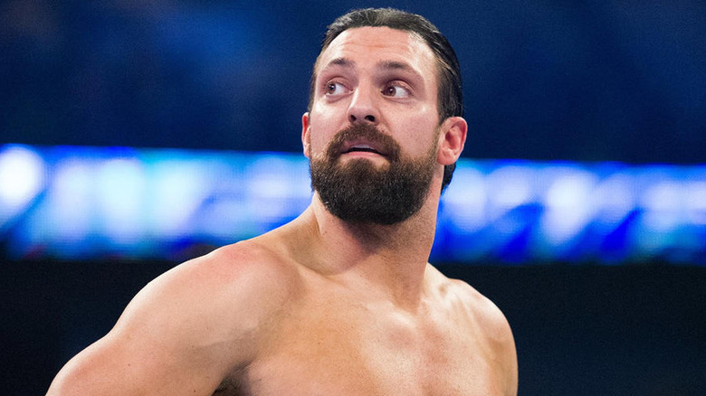 Aaron Stevens performing as Damian Sandow in WWE