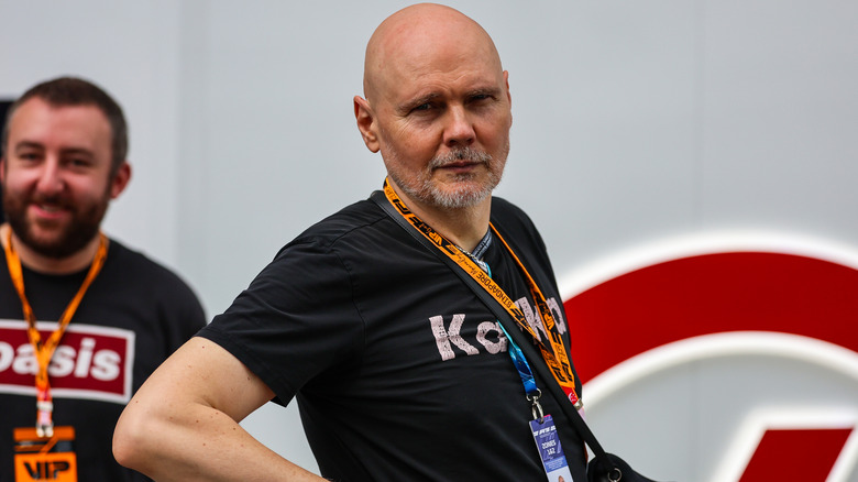 Billy Corgan with lanyards around his neck