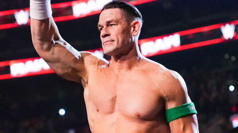 John Cena wearing a green arm band