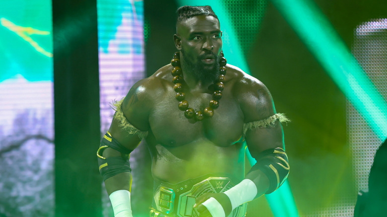 The NXT Champion, Oba Femi enters the arena during NXT at the WWE Performance Center on May 13, 2025 in Orlando, Florida.