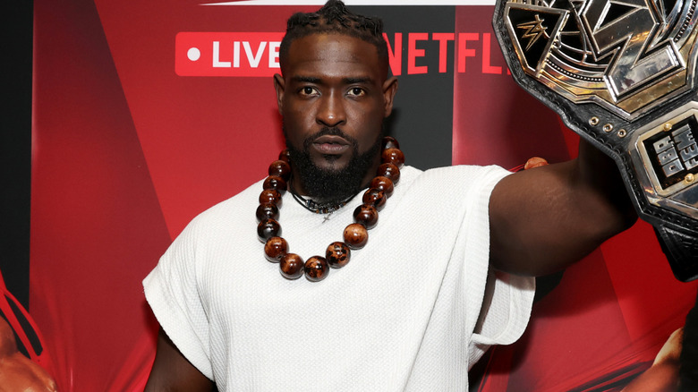 Oba Femi holding the NXT Championship