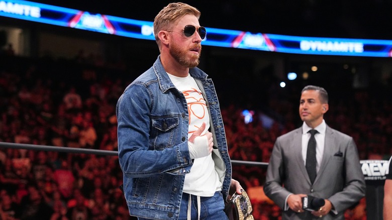Orange Cassidy Does His Signature Pose Before A Match