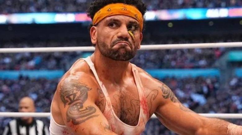 Ortiz sits in the ring, a pout on his face, following a match on AEW programming.