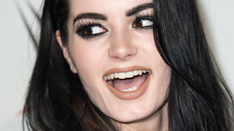 Paige smiles