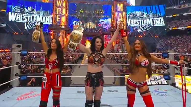 Brie Bella, Paige, and Nikki Bella celebrate at WrestleMania 42