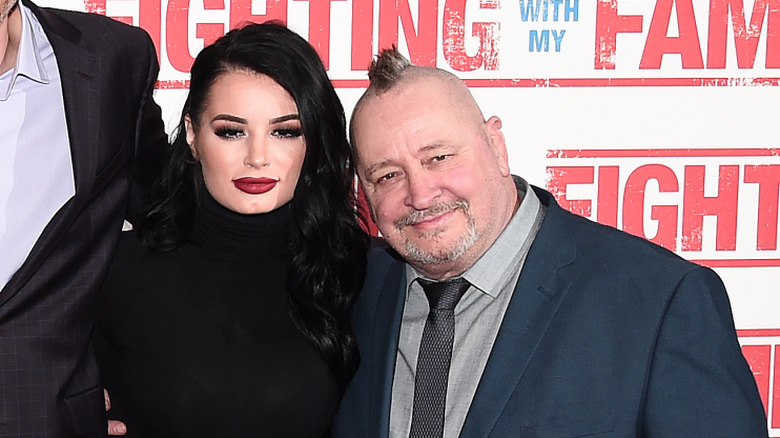 Paige with her father Ricky Knight at the Fighting with my Family premiere