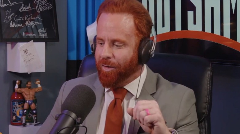 Pat Buck sits down and speaks during an interview with Sam Roberts on the 