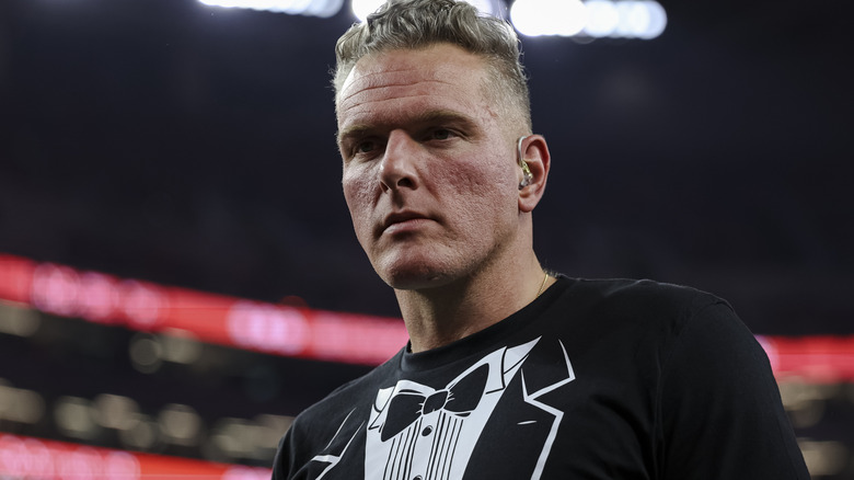 Pat McAfee wearing an ear piece