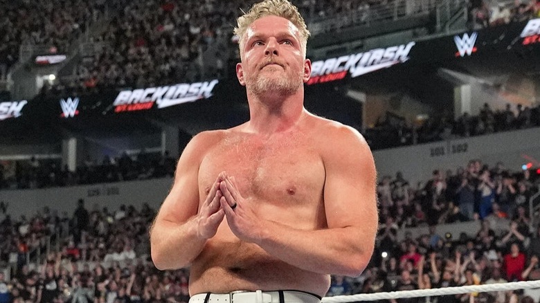 Pat McAfee takes in the crowds reactions after falling short to GUNTHER