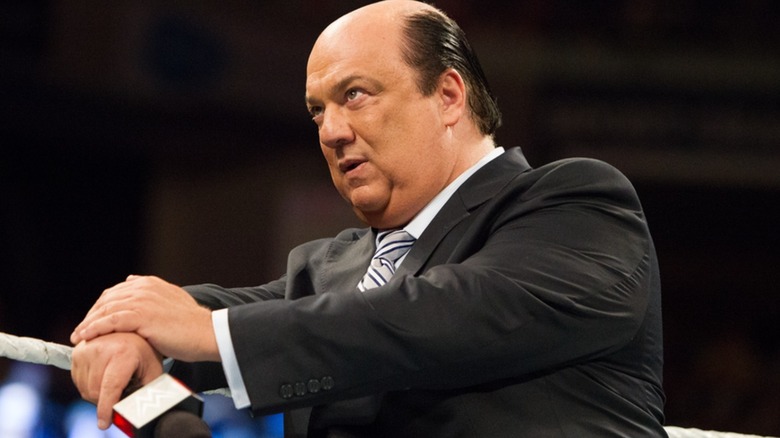 Paul Heyman looks into the ring