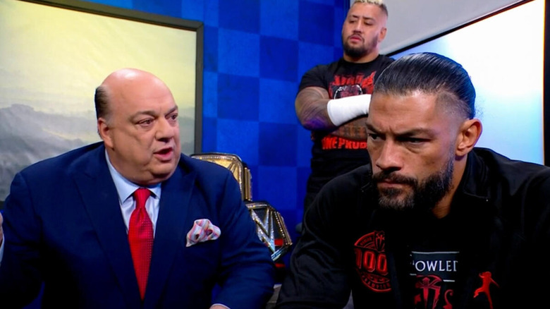 Paul Heyman, Solo Sikoa, and Roman Reigns