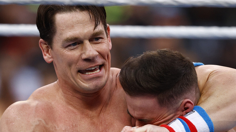 John Cena cinches in a headlock