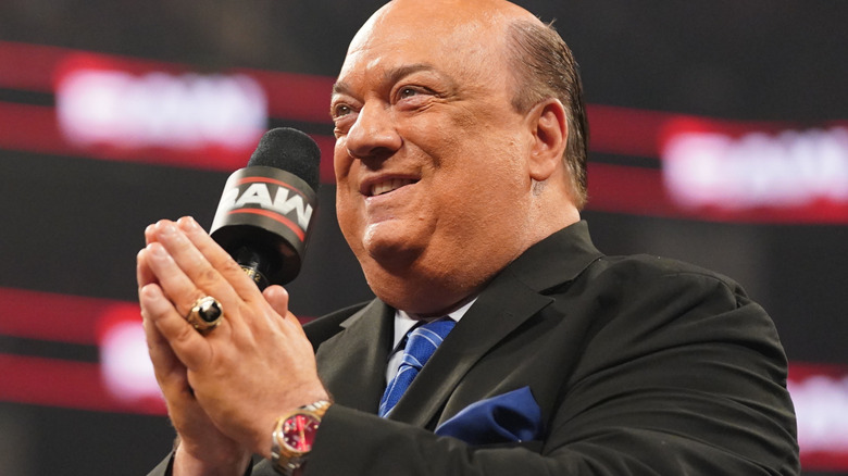 Paul Heyman holding a microphone