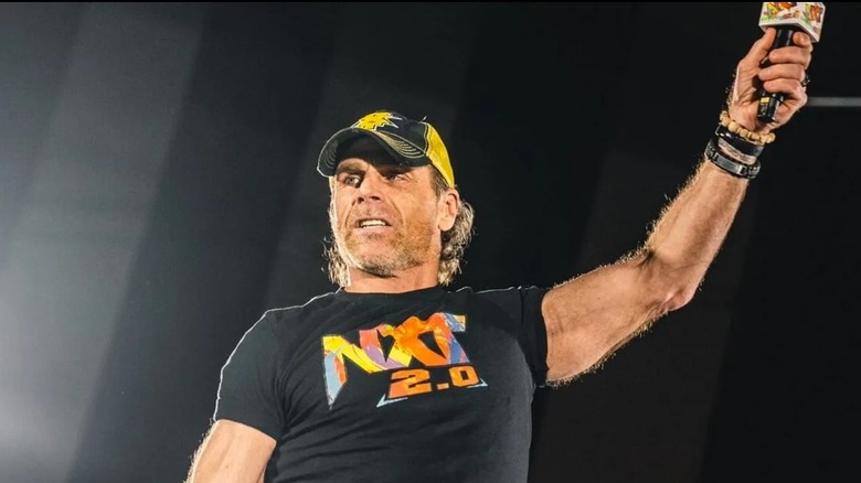 Shawn Michaels holds an 