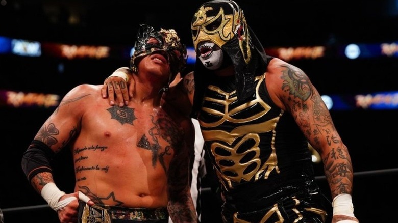 Penta embracing his brother Rey Fenix during an episode of "AEW Rampage."