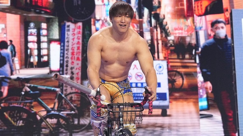 Kota Ibushi rides a bicicyle 