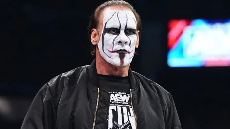 Sting wearing black and white face paint 
