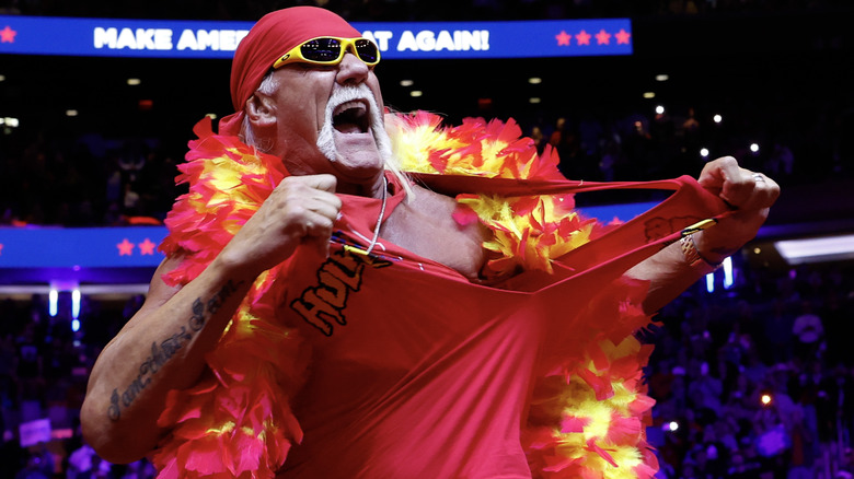 Hulk Hogan removes his shirt at a Make America Great Again rally.
