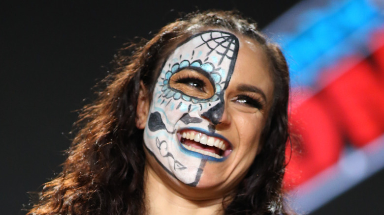 Thunder Rosa Laughs At A Promotional Event