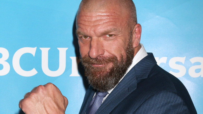 Triple H posing