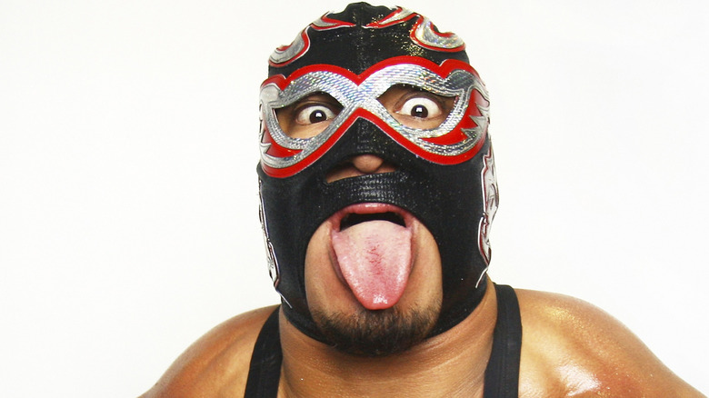Silver King sticks tongue out