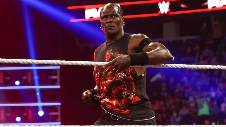R-Truth looks to step in the ring, a worried expression on his face, before a match against GUNTHER on a December 2025 edition of 