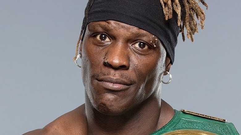 R-Truth poses for a studio photo