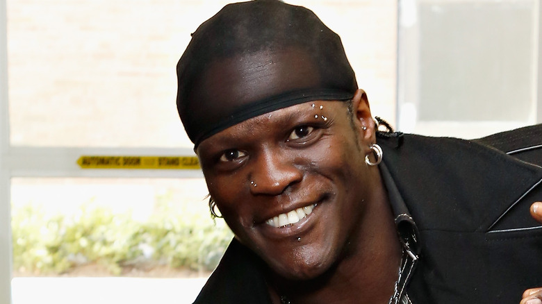 R-Truth posing for a fan