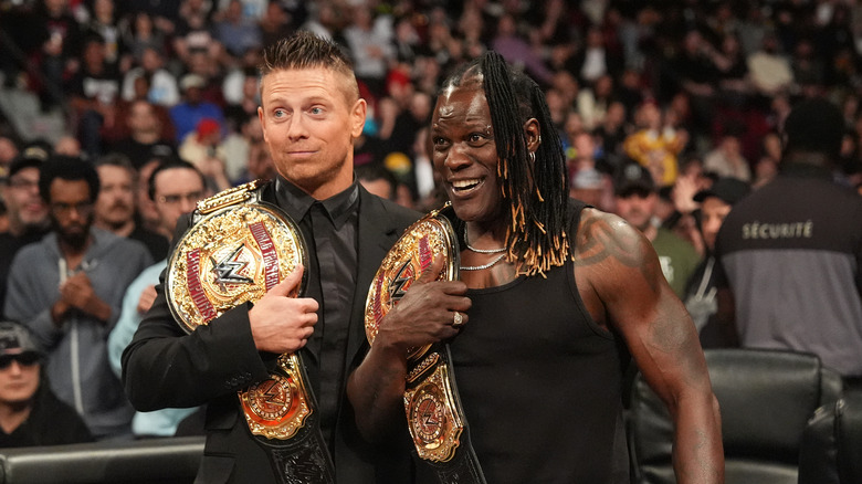 R Truth and the Miz with World Tag Team Titles