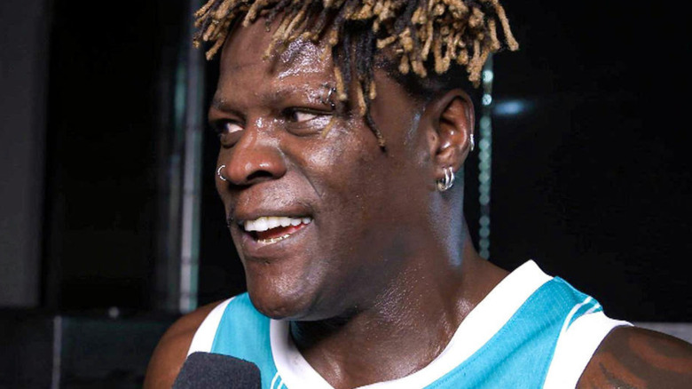 r-truth smiling