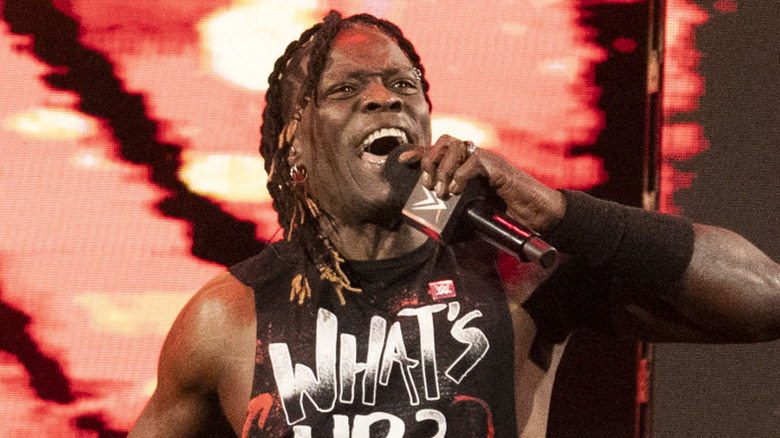 R-Truth holding a microphone