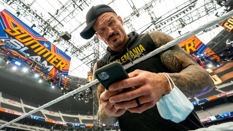 Randy Orton Scrolls Through His Phone