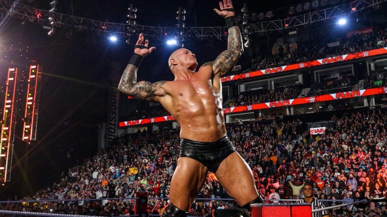 Randy Orton hits his signature pose on the ropes during an episode of 