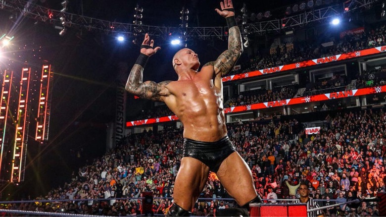 Randy Orton hits his signature pose in the corner ahead of a match on 
