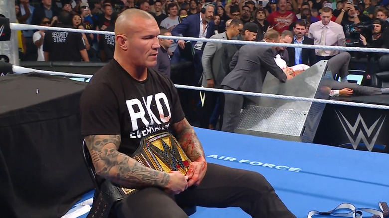 Randy Orton sits with the WWE Championship
